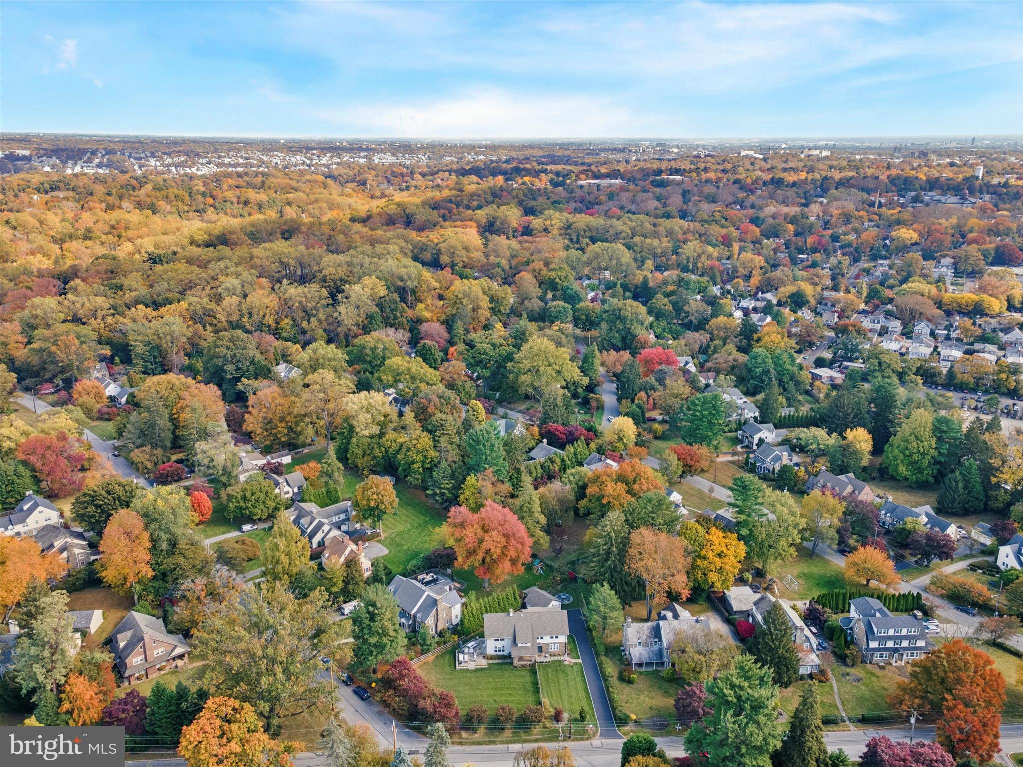 603 Old Gulph Road Penn Valley, PA 19072 - Photo 57 of 58 an aerial view of a city with lots of residential buildings and mountain view in back