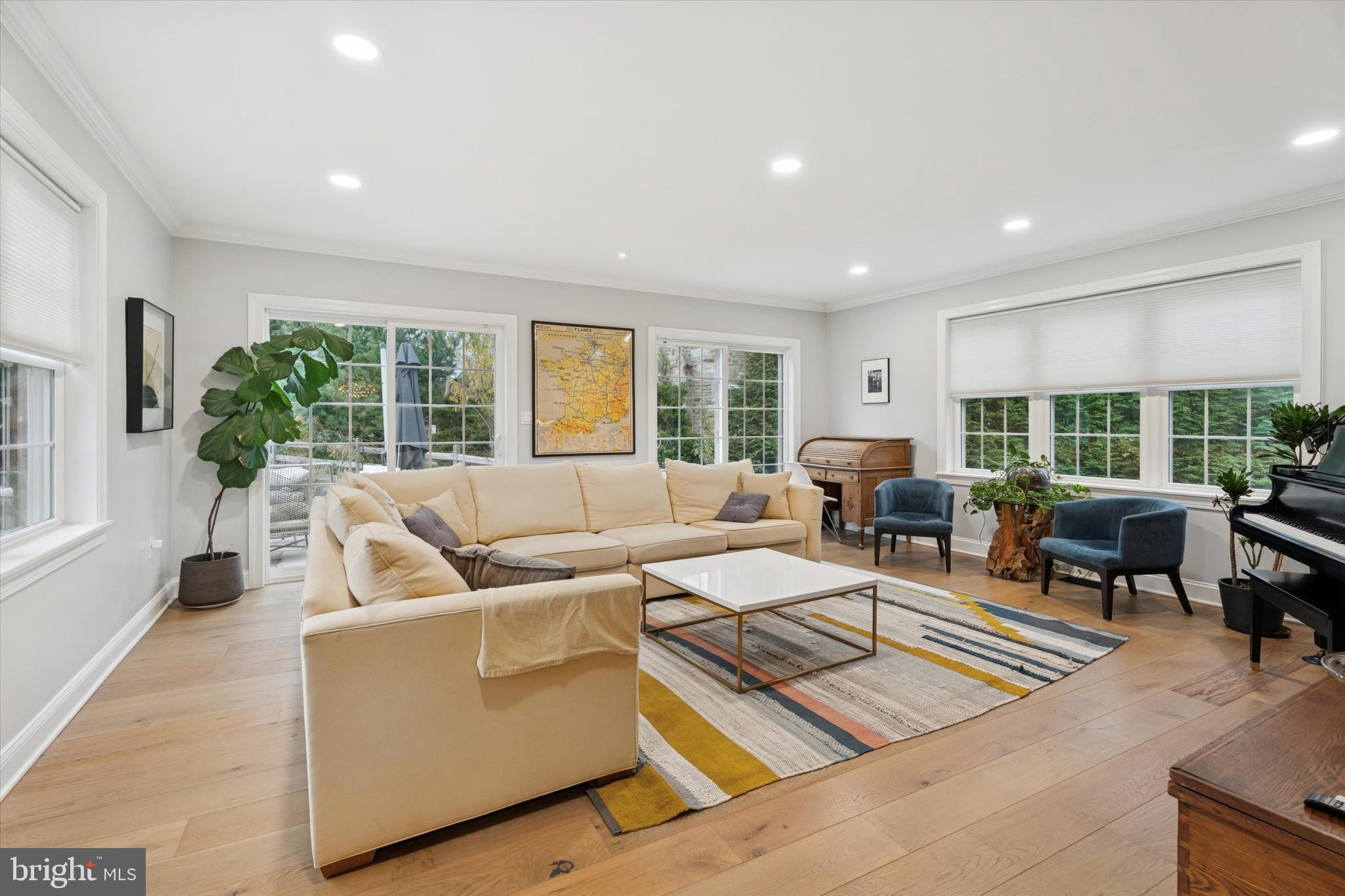 603 Old Gulph Road Penn Valley, PA 19072 - Photo 8 of 58 a living room with furniture and a large window