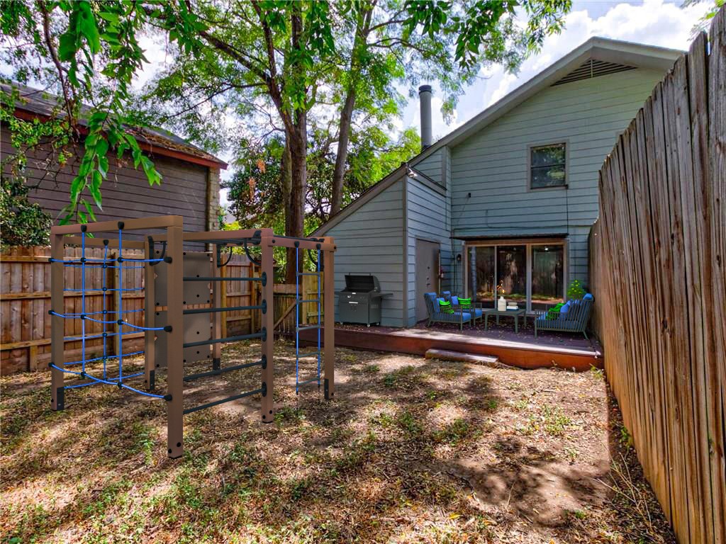 1710 Cinnamon Path Austin, TX 78704 - Photo 13 of 40 a front view of a house with garden