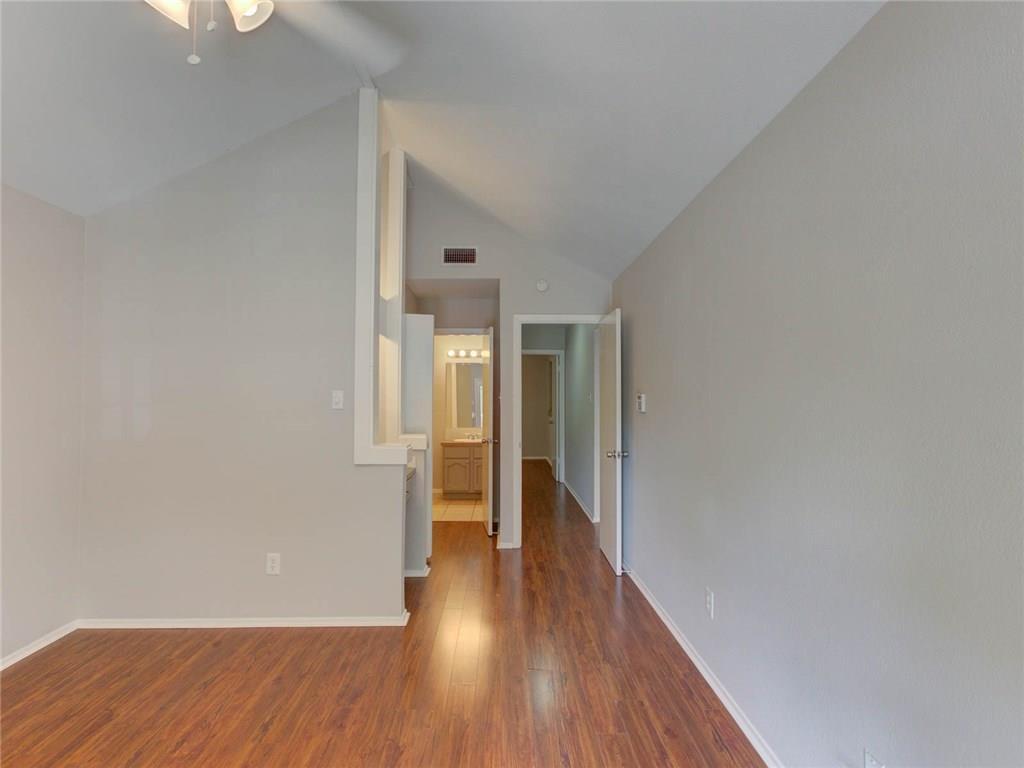 1710 Cinnamon Path Austin, TX 78704 - Photo 16 of 40 a view of hallway with wooden floor