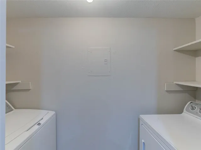 a bathroom with a toilet and a sink