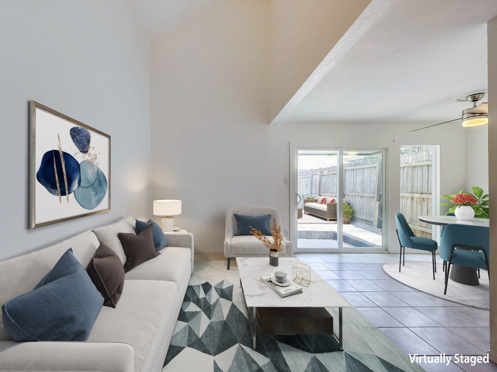 1710 Cinnamon Path Austin, TX 78704 - Photo 20 of 40 a living room with furniture and a large window