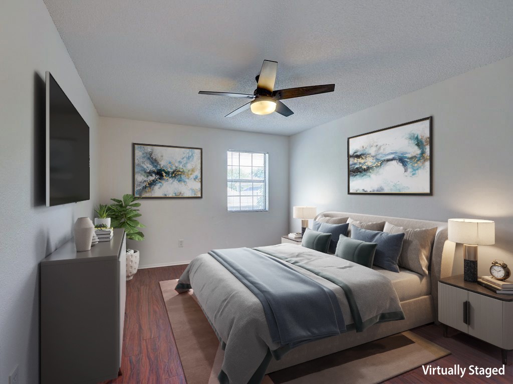 1710 Cinnamon Path Austin, TX 78704 - Photo 22 of 40 a bedroom with bed and a chandelier