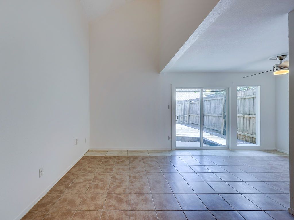 1710 Cinnamon Path Austin, TX 78704 - Photo 25 of 40 a view of an empty room with glass door
