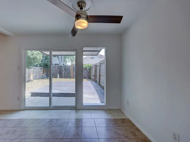 a view of a kitchen with a sink and a stove
