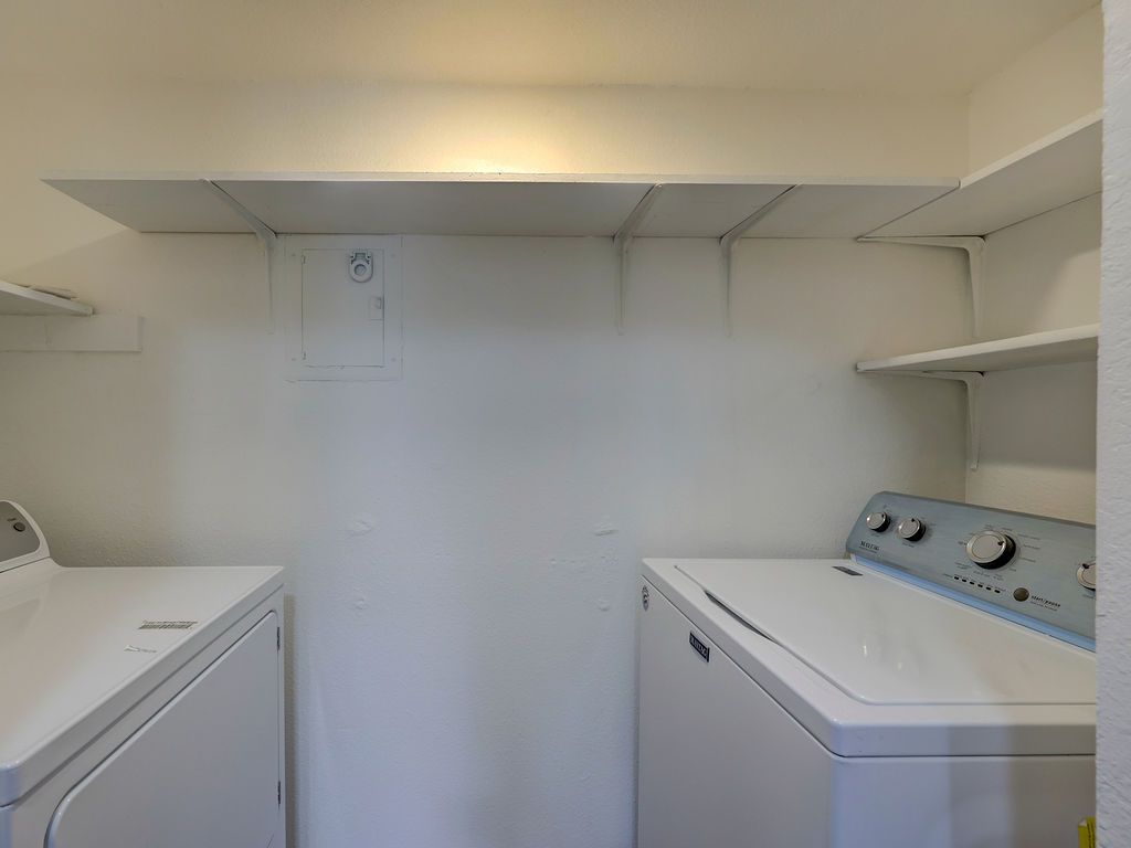 1710 Cinnamon Path Austin, TX 78704 - Photo 38 of 40 a utility room with dryer and washer