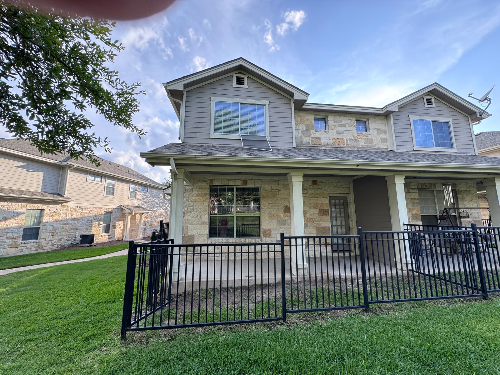 1900 Scofield Ridge Parkway, Unit 2103 Austin, TX 78727 - Photo 31 of 35 Yard with gate on the back