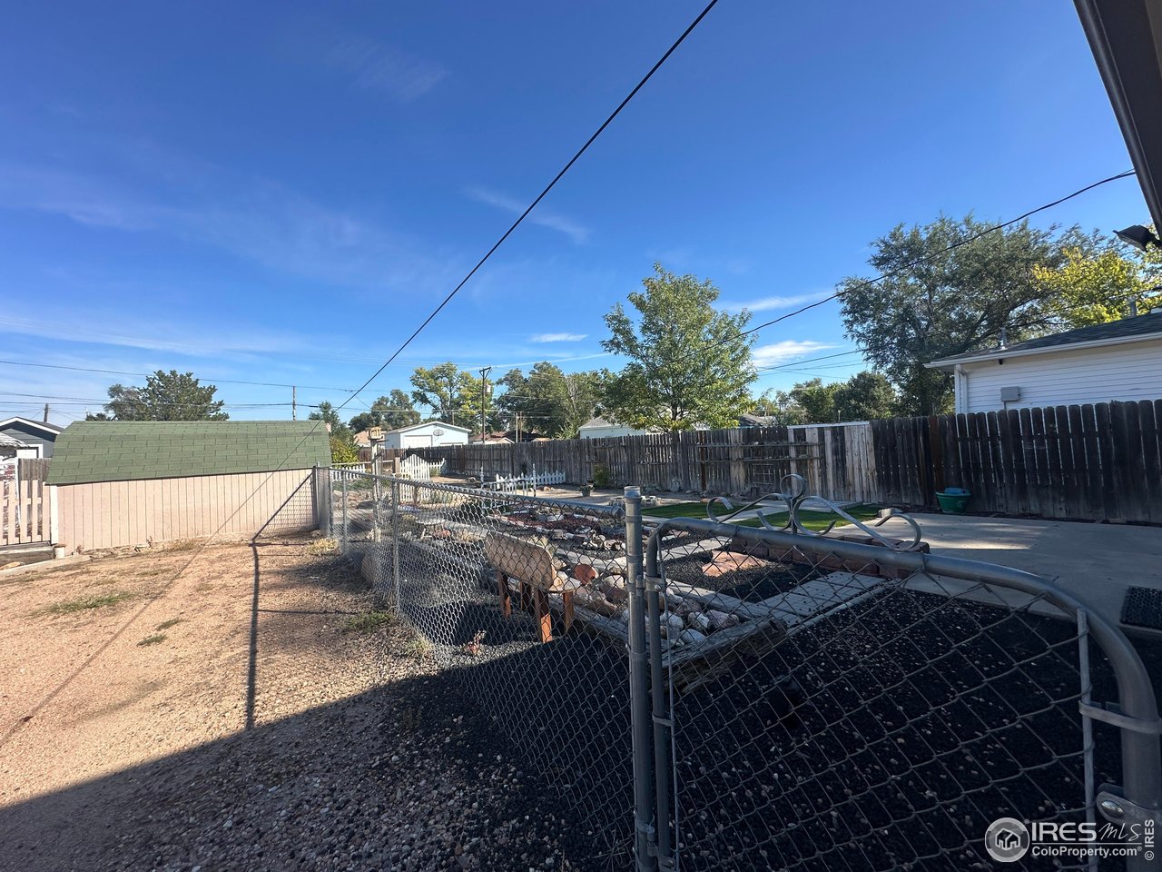 224 State Street Sterling, CO 80751 - Photo 17 of 23 a view of a backyard