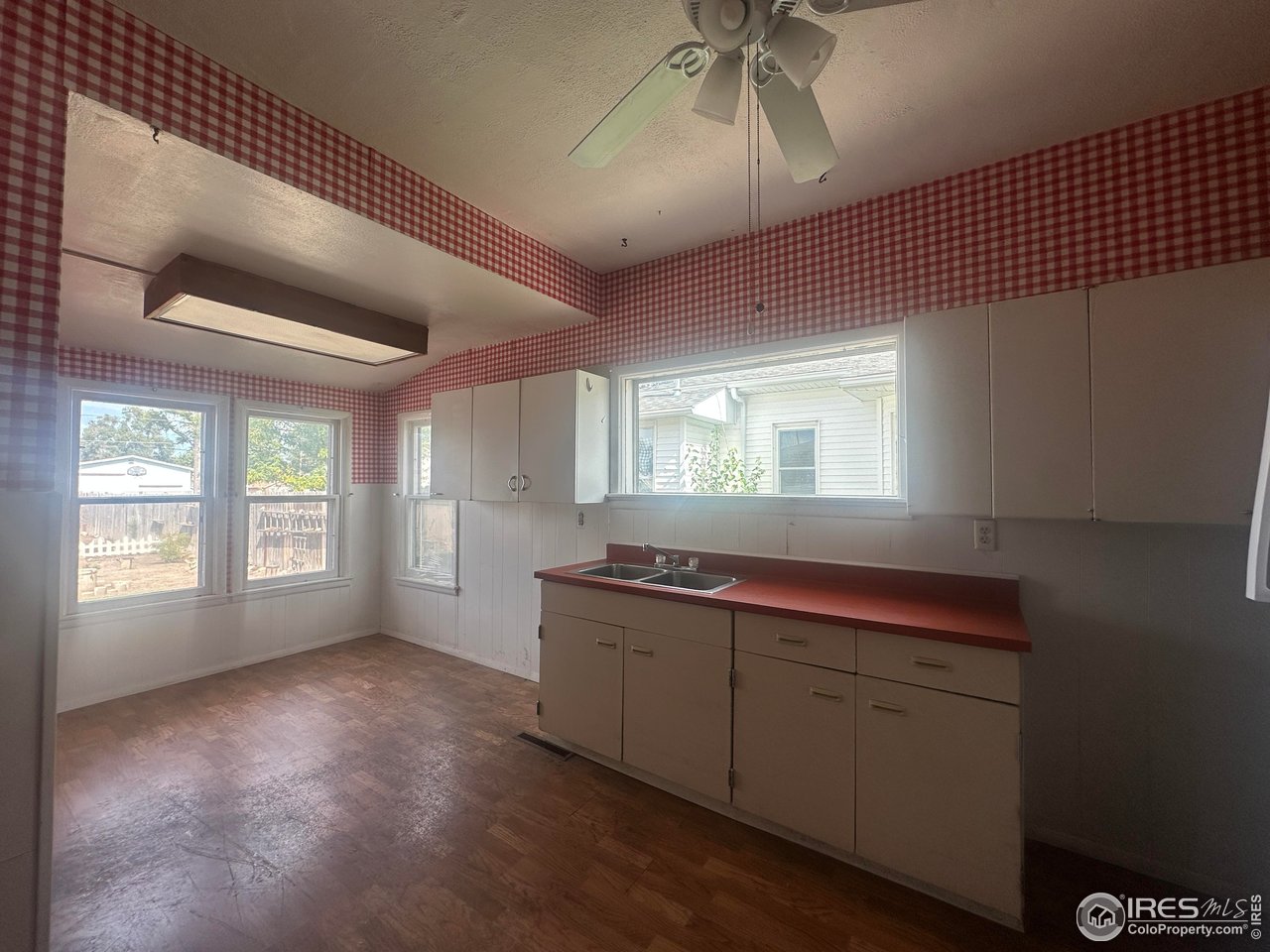 224 State Street Sterling, CO 80751 - Photo 5 of 23 a view of an empty room with a window