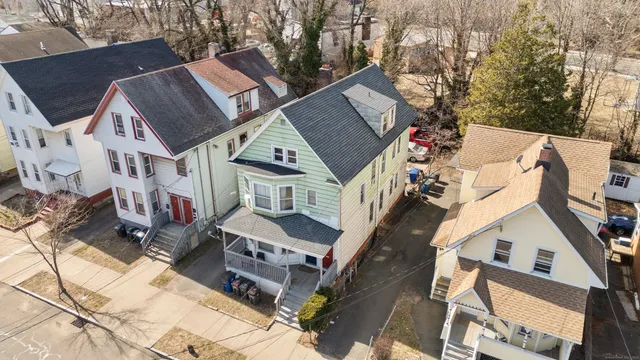 a aerial view of a house with a yard