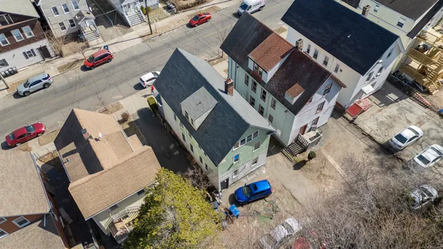 an aerial view of a fireplace with wooden floor