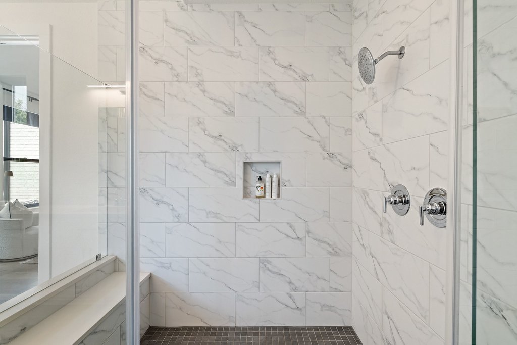 2324 High Lonesome Leander, TX 78641 - Photo 20 of 40 The walk-in shower is equipped with dual shower heads with a rainfall option.
