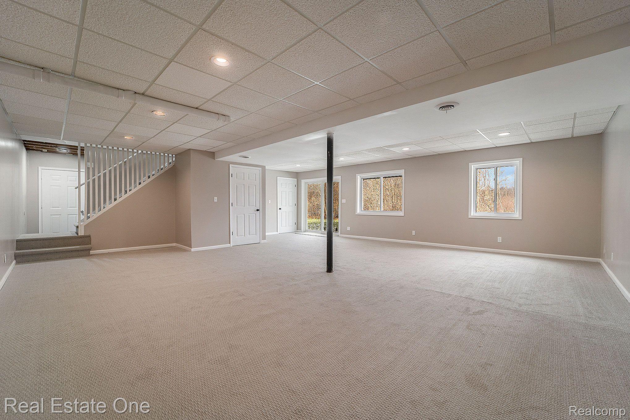 4240 East Commerce Road Commerce Township, MI 48382 - Photo 21 of 27 Finished Walk-Out Lover Level