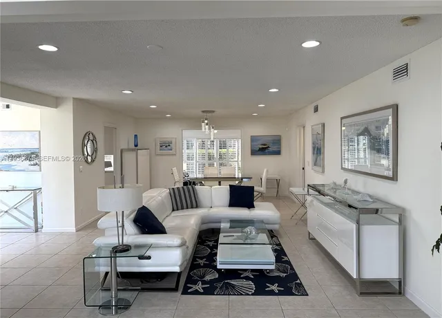 a living room with furniture or couch and a wooden floor