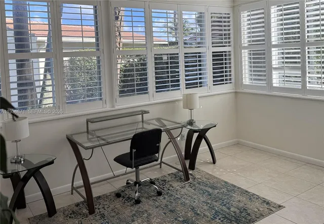 a workspace room with a window