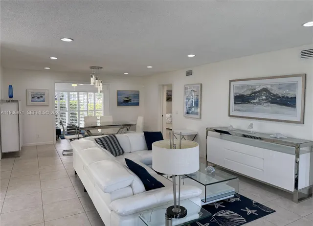 a living room with furniture or couch and a coffee table