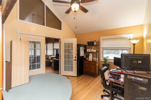 a workspace with furniture and window