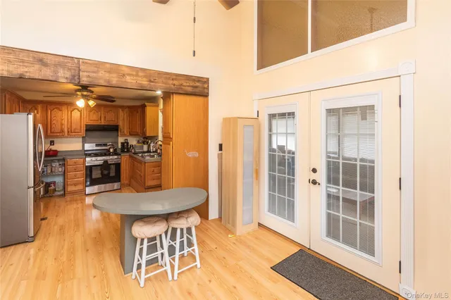 a kitchen with a table and chairs