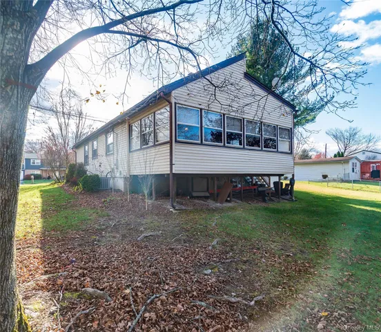 a house view with a garden space