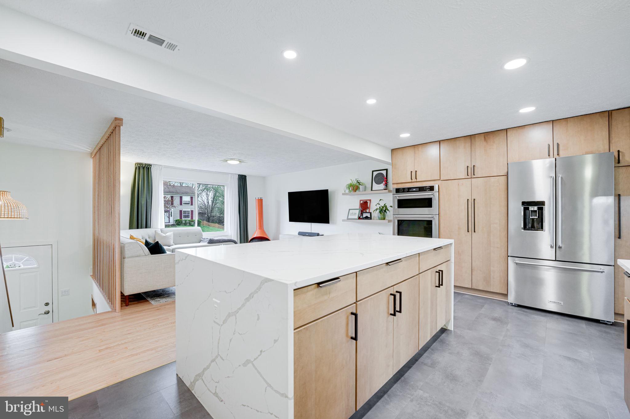 4425 Cub Run Road Chantilly, VA 20151 - Photo 15 of 43 a kitchen that has a lot of cabinets and wooden floor
