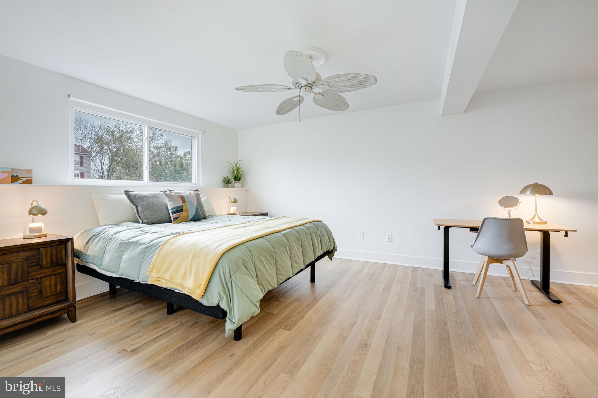 4425 Cub Run Road Chantilly, VA 20151 - Photo 25 of 43 a bedroom with a bed and a table