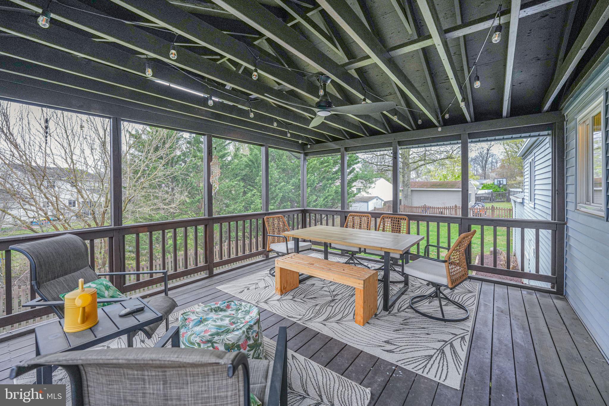 4425 Cub Run Road Chantilly, VA 20151 - Photo 33 of 43 a balcony with furniture and wooden floor