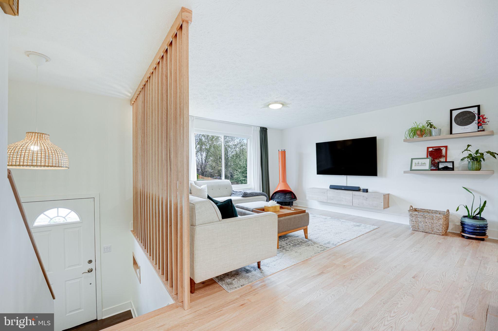 4425 Cub Run Road Chantilly, VA 20151 - Photo 5 of 43 a living room with furniture and a flat screen tv