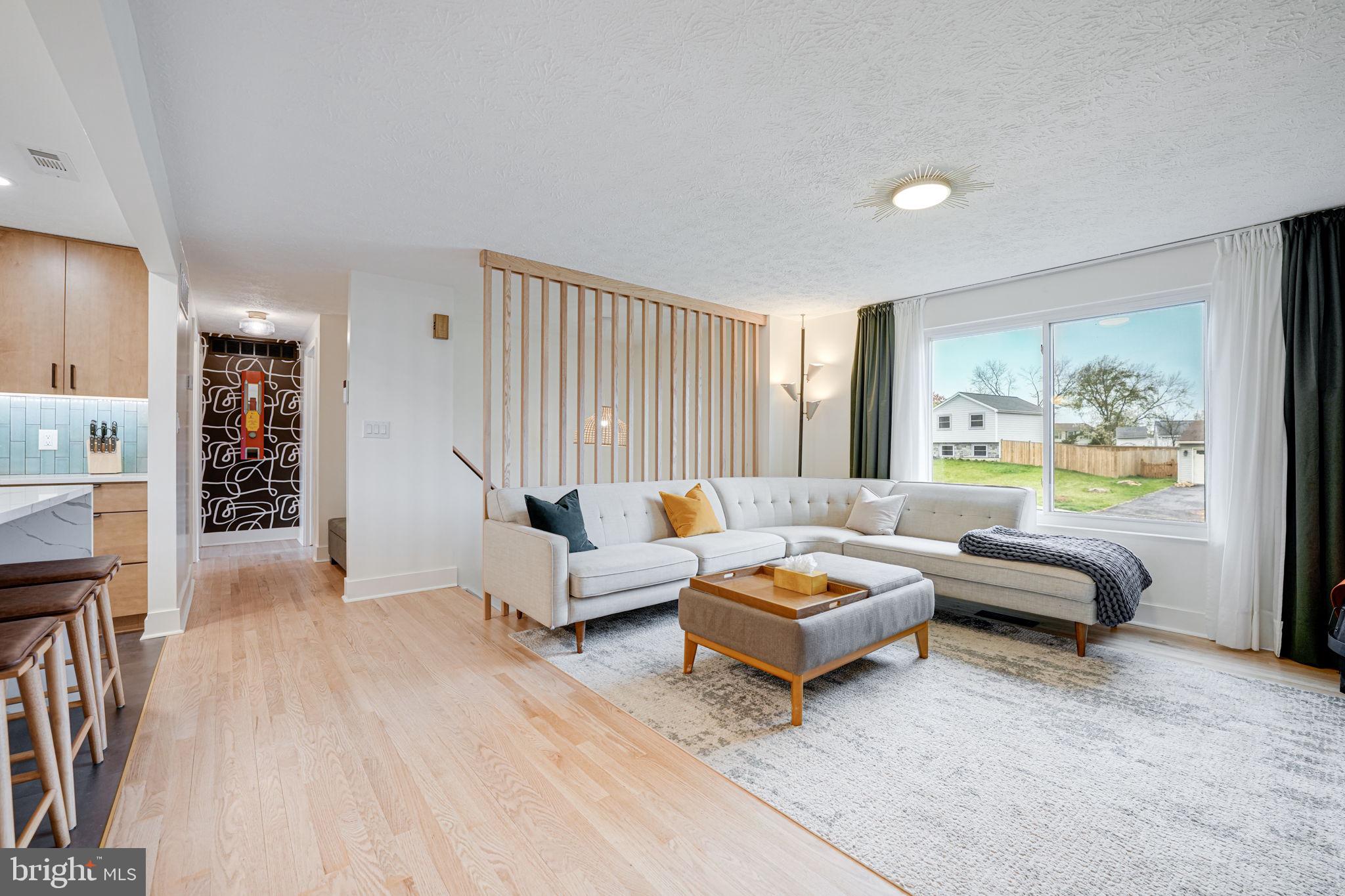 4425 Cub Run Road Chantilly, VA 20151 - Photo 6 of 43 a bedroom with furniture and a book shelf