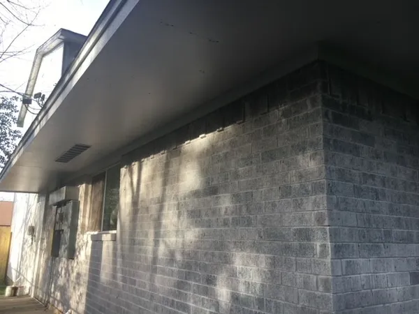 a empty room with windows