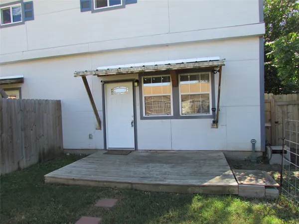 a front view of a house with garage