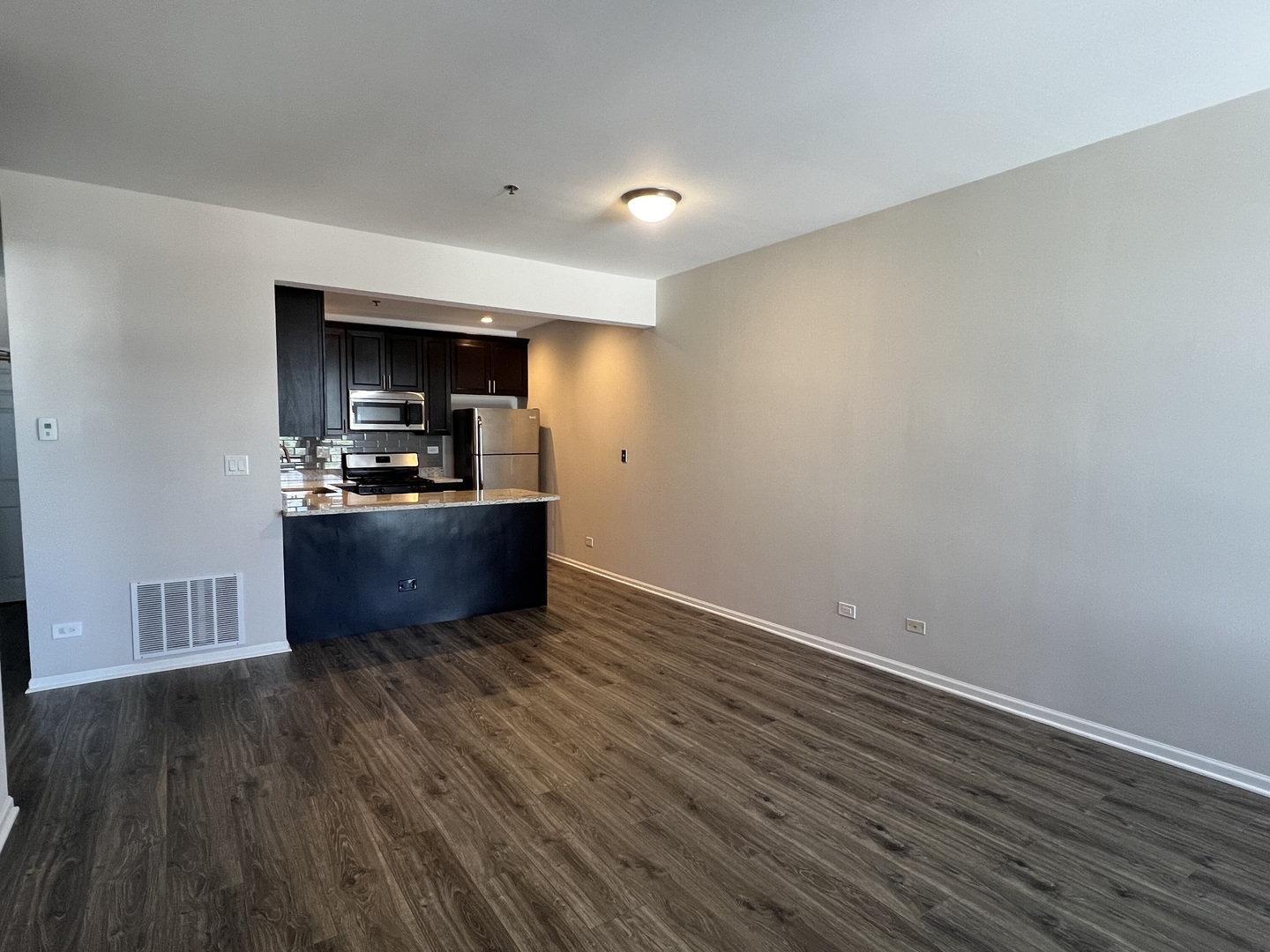 625 Deerfield Road, Unit 402 Deerfield, IL 60015 - Photo 2 of 5 a view of kitchen with wooden floor