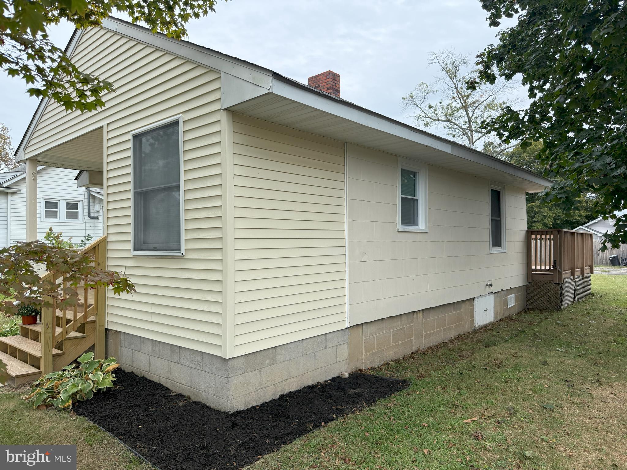 269 B Street Carneys Point, NJ 08069 - Photo 16 of 17 a view of a house with a yard and garage