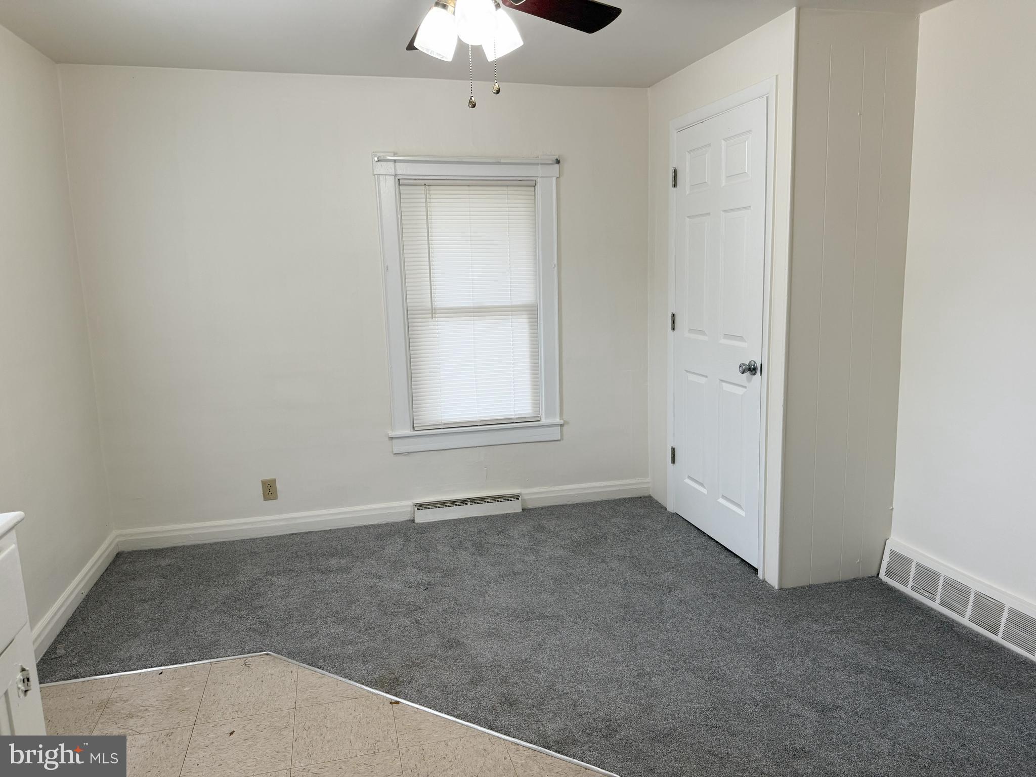 269 B Street Carneys Point, NJ 08069 - Photo 6 of 17 an empty room with a empty space and a window