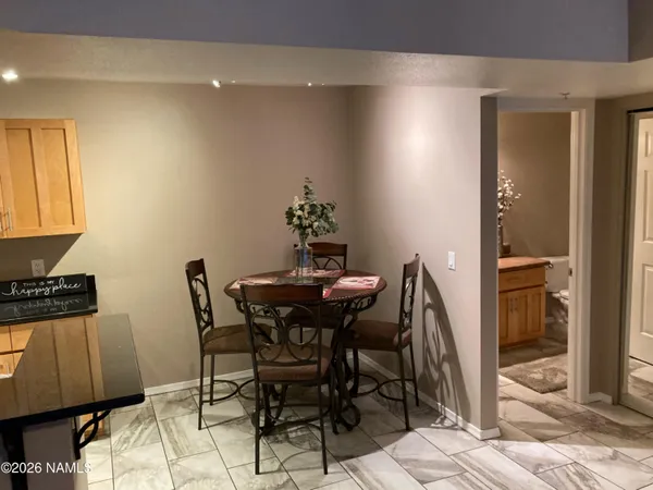 a view of a dining room with furniture