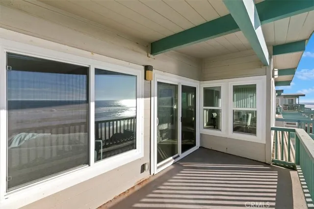 a view of a hallway with washer and dryer
