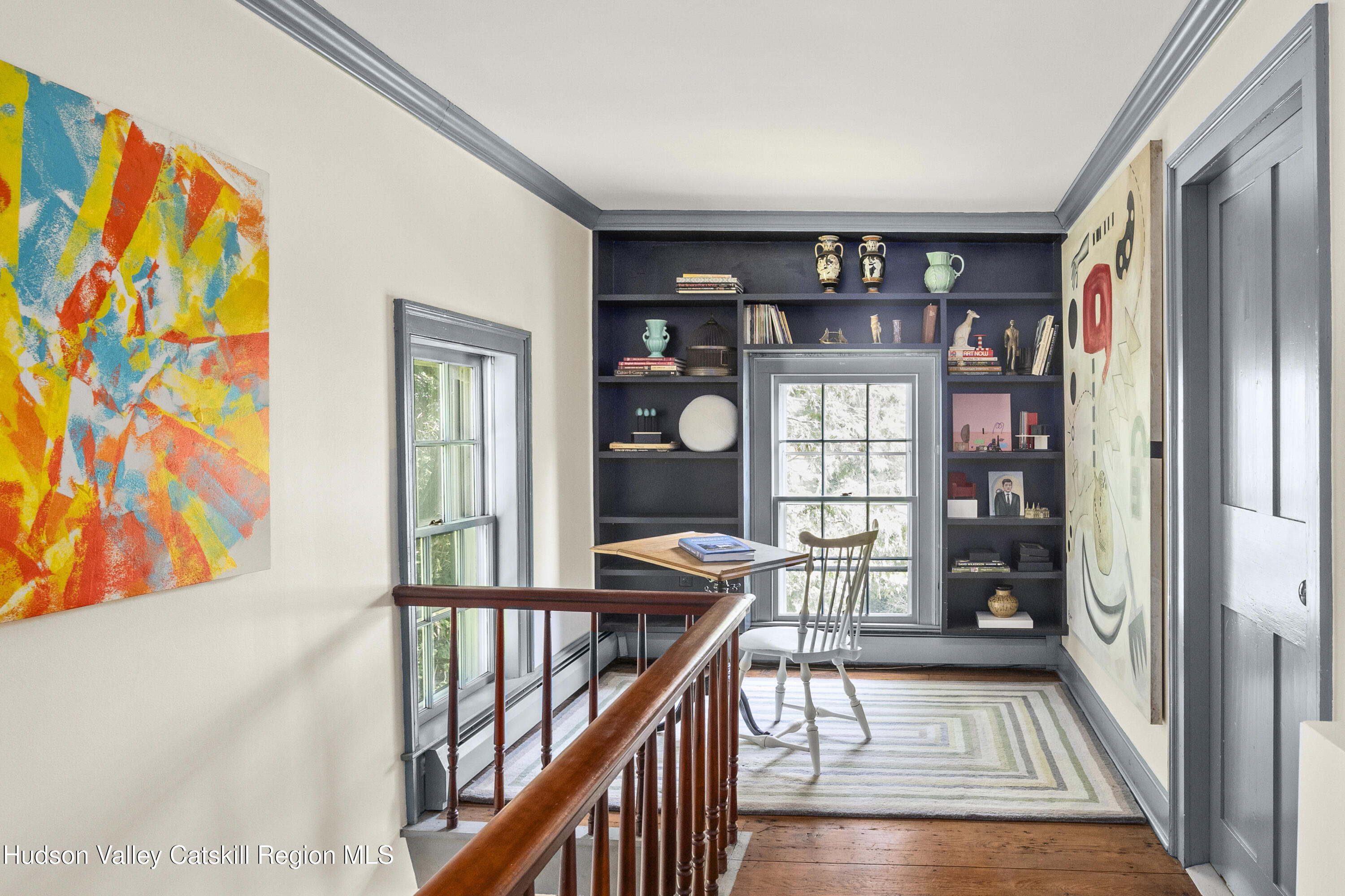 11549 Highway 22 Austerlitz, NY 12017 - Photo 14 of 28 a view of a hallway with wooden floor and staircase