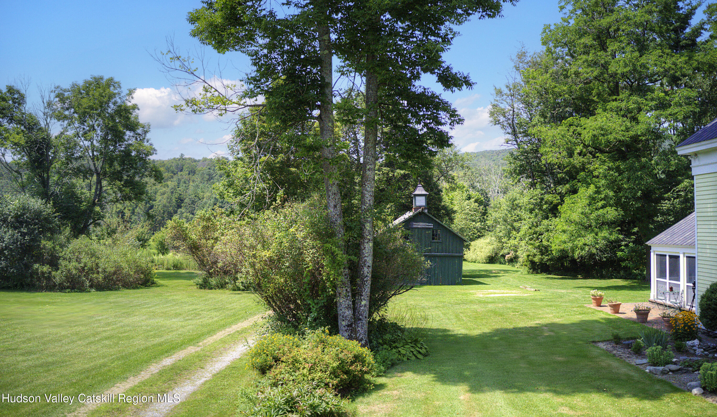 11549 Highway 22 Austerlitz, NY 12017 - Photo 4 of 28 a view of a house with a yard