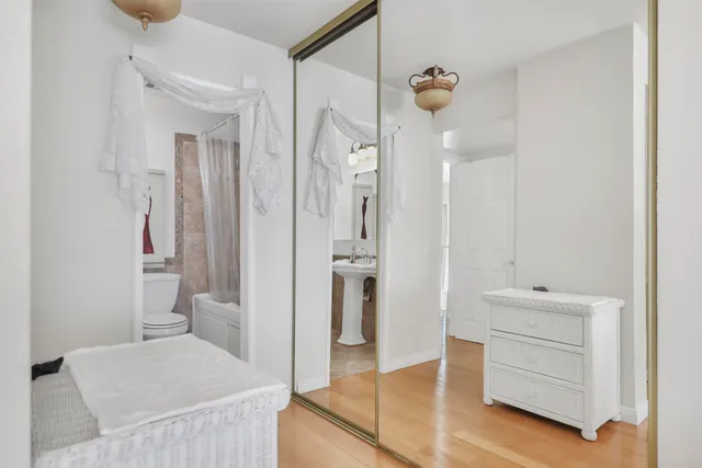 a bathroom with a tub and a shower