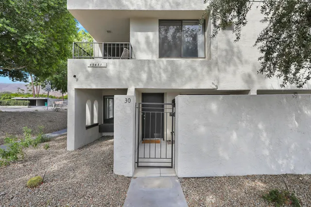 a house view with a outdoor space