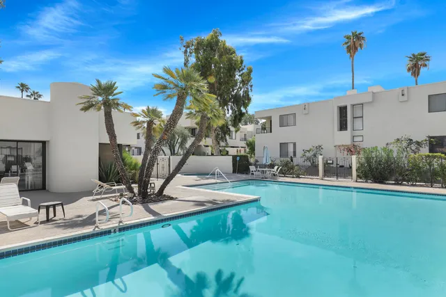 a view of a house with swimming pool