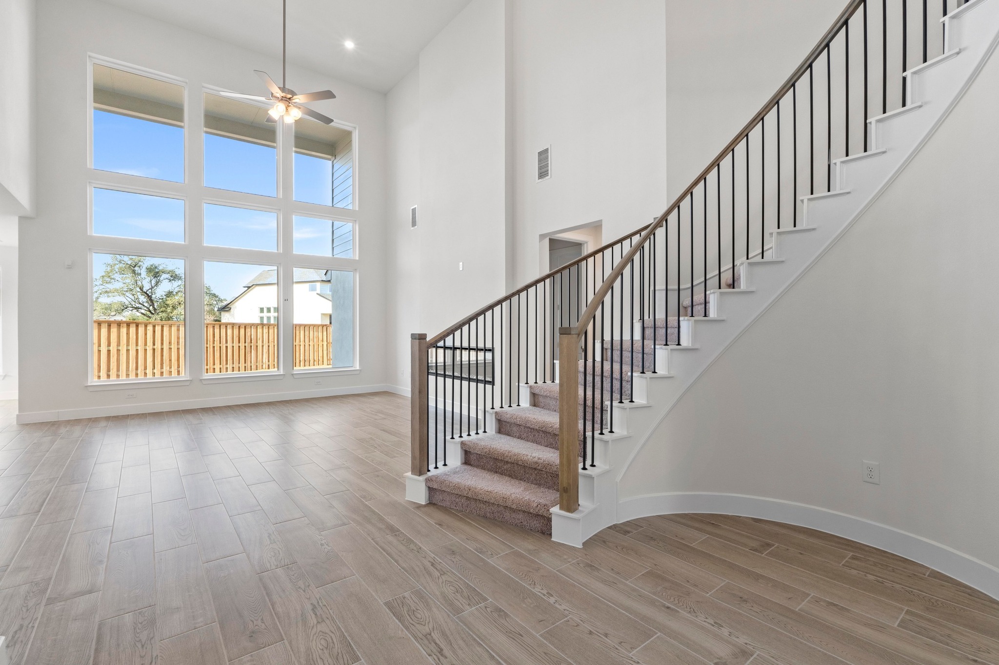 604 Lightstone Drive Georgetown, TX 78633 - Photo 19 of 39 a view of entryway with wooden floor