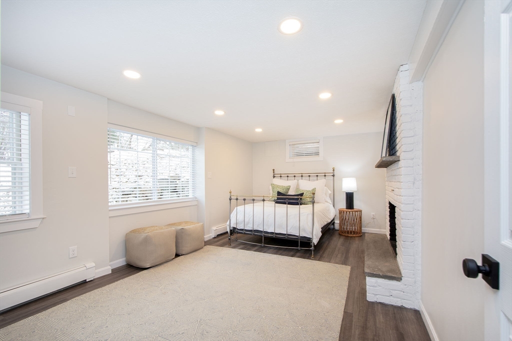 64 Cross Street Hingham, MA 02043 - Photo 18 of 23 a bed room with furniture and a window