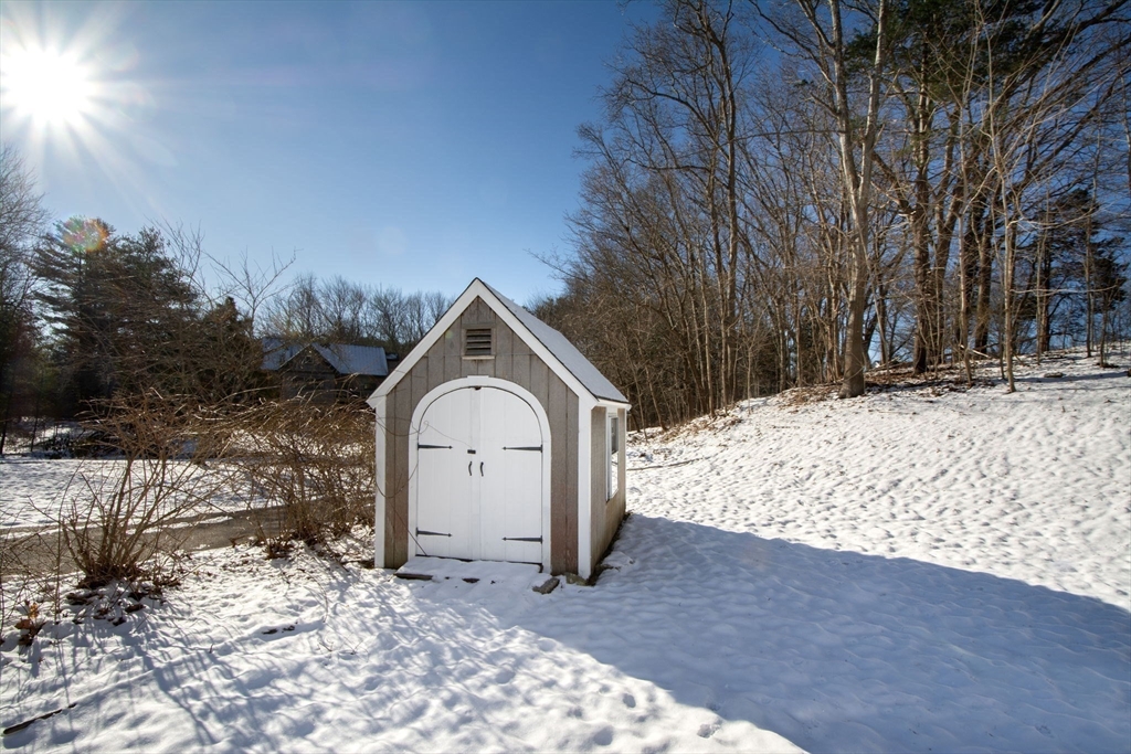 64 Cross Street Hingham, MA 02043 - Photo 23 of 23 a view of garage yard and covered with snow
