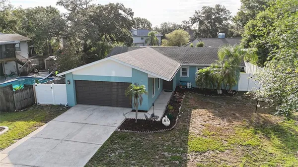a view of a small house in the back yard