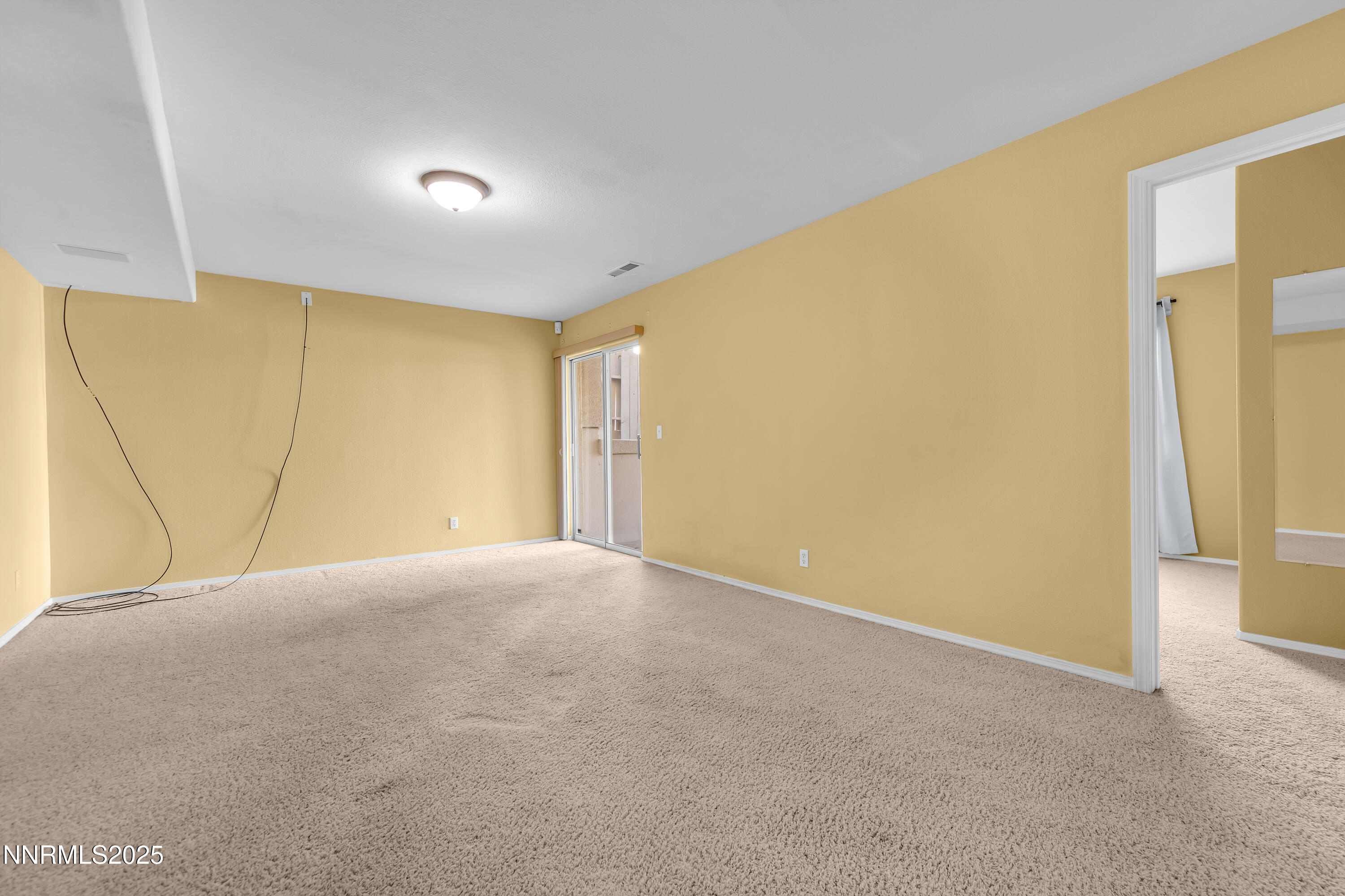 6248 Golden Meadow Road Reno, NV 89519 - Photo 34 of 64 a view of an empty room with a window