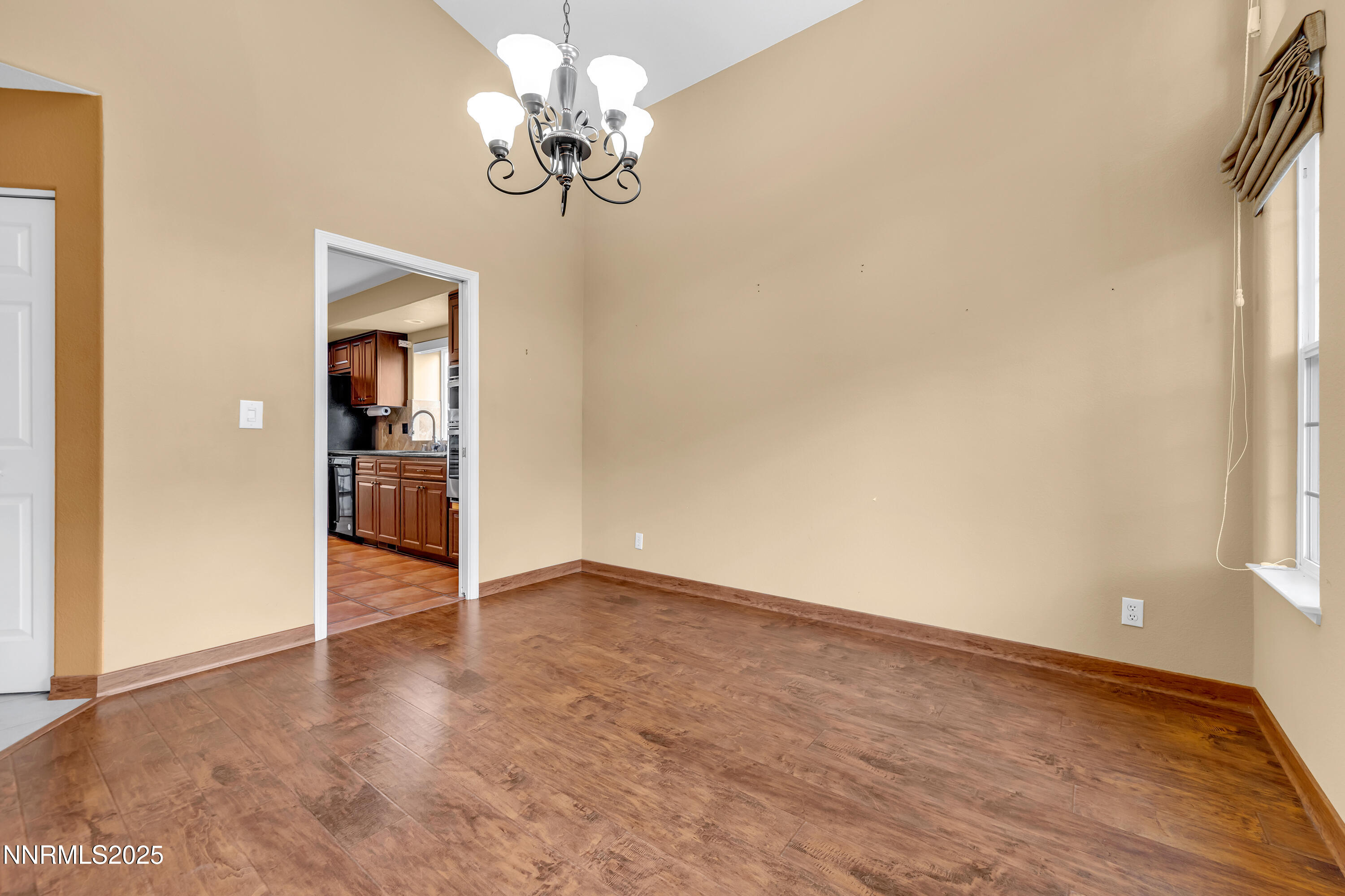 6248 Golden Meadow Road Reno, NV 89519 - Photo 6 of 64 a view of an empty room with a window