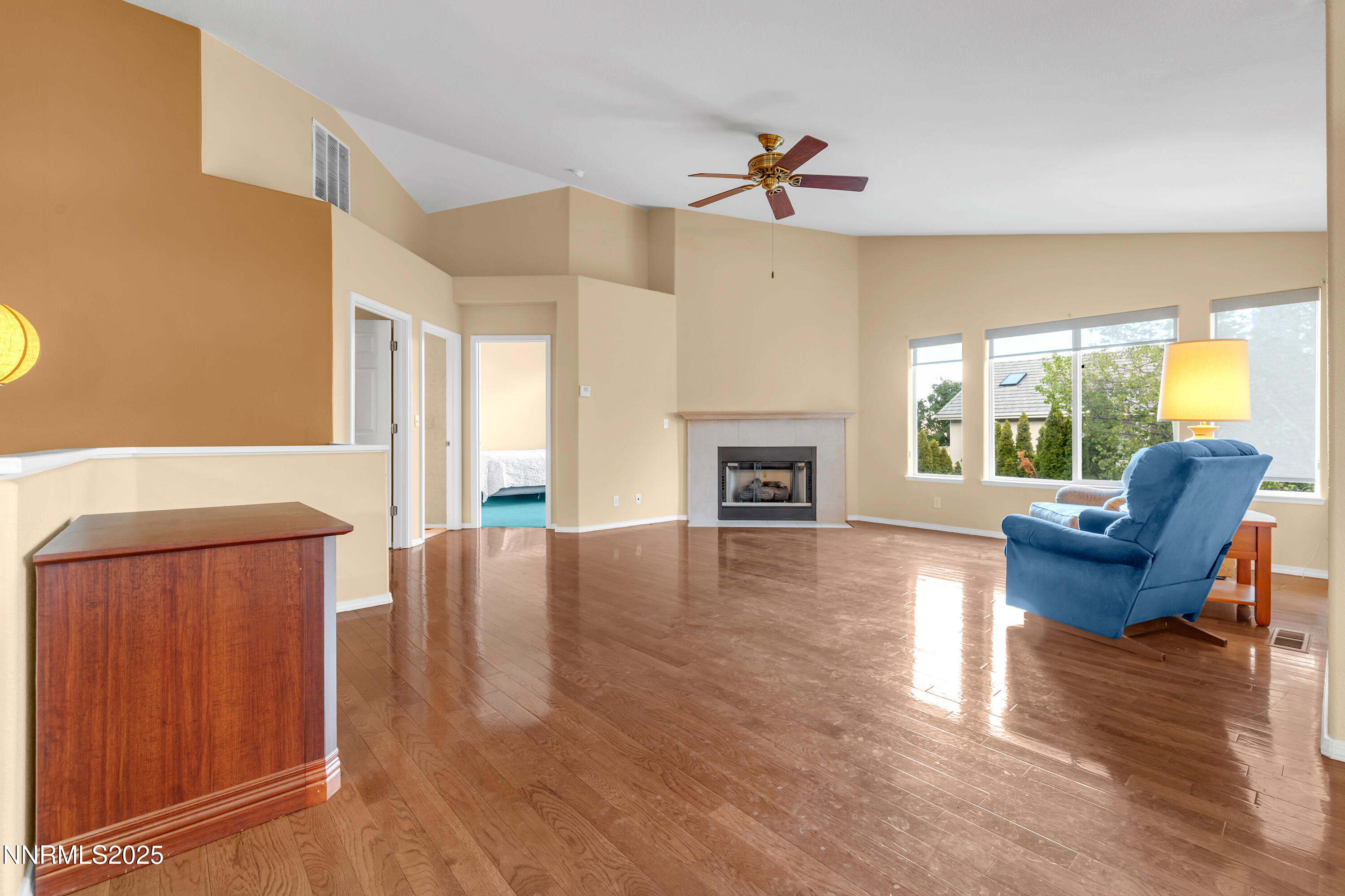 6248 Golden Meadow Road Reno, NV 89519 - Photo 8 of 64 a living room with furniture and a fireplace