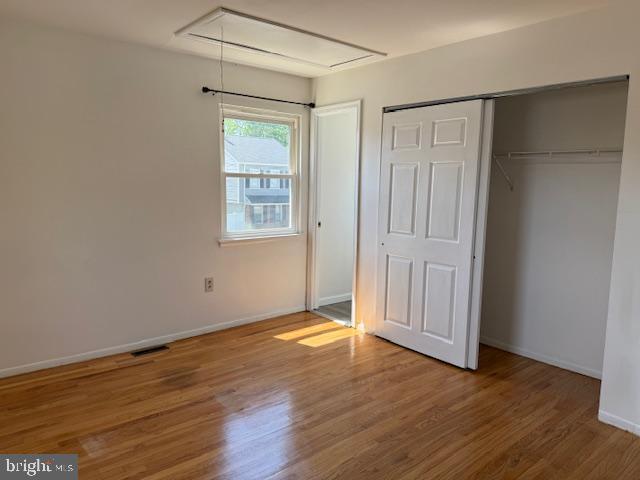28 Keith Street Newark, DE 19713 - Photo 12 of 20 an empty room with wooden floor and windows