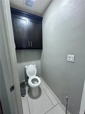 a bathroom with a toilet