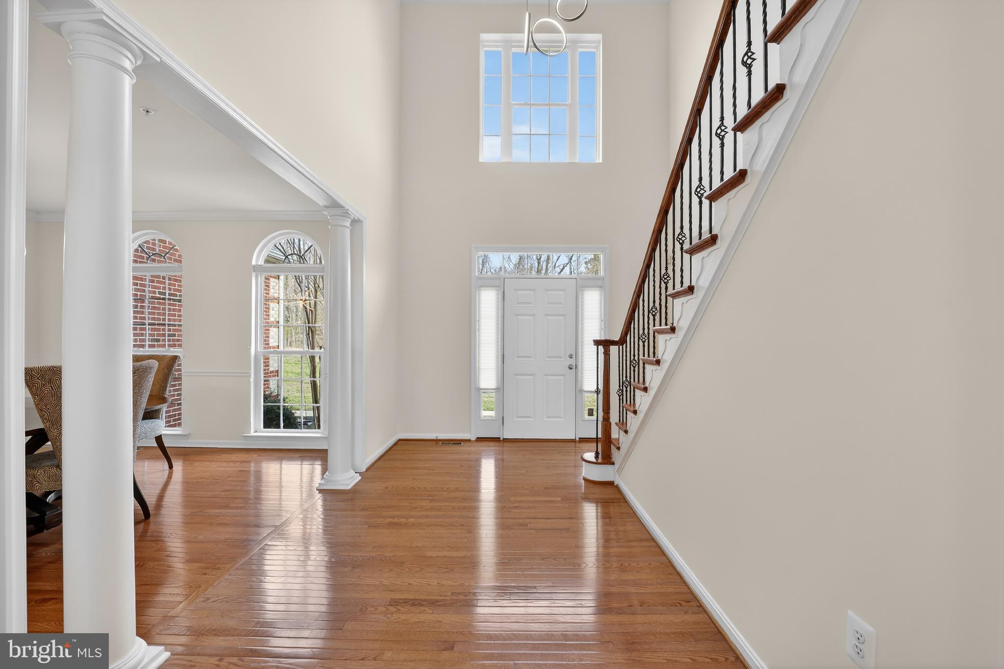 16101 Venice Road Aquasco, MD 20608 - Photo 13 of 60 a view of an entryway with wooden floor and stairs